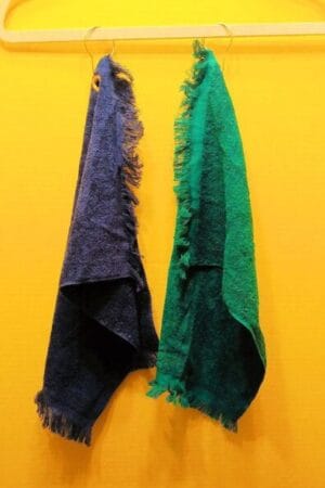 Fingertip towel with grommet and hook by 1880 Mills