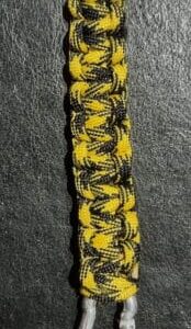 black and gold paracord keychain