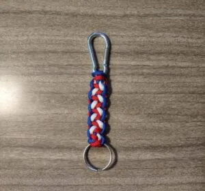 red, white and blue paracord keychain