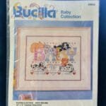 puppies and kittens birth record cross stitch kit by Bucilla