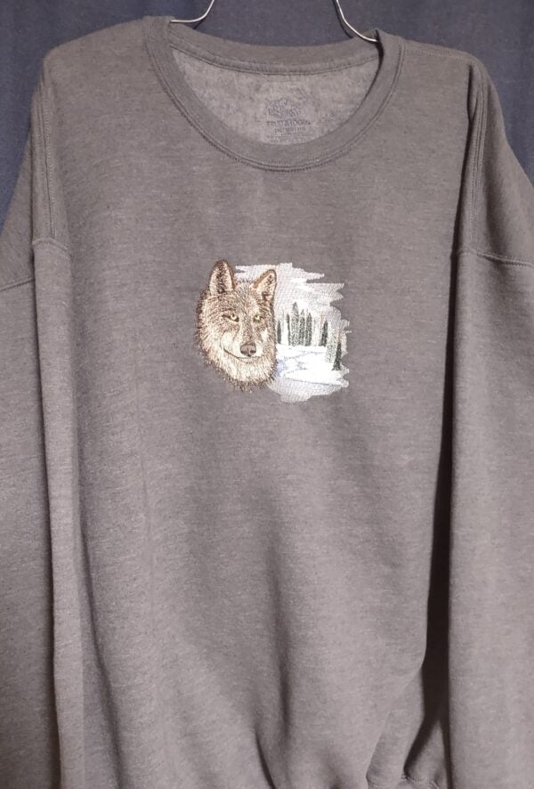embroidered wolf on sweatshirt