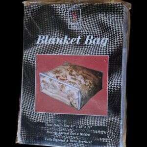 Large clear plastic blanket bag by Signature Series with white trim and zipper closure