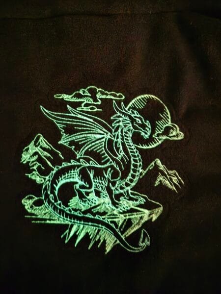 glow thread dragon embroidery on black sweatshirt