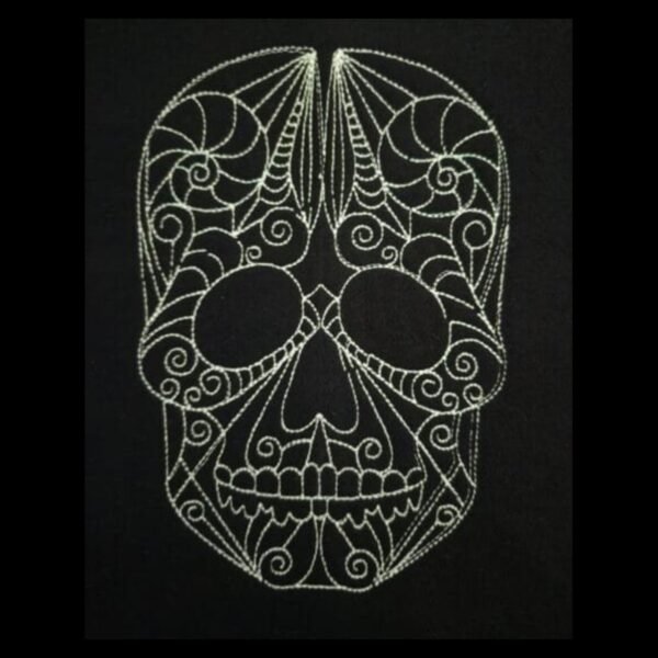 skull candy embroidered on a sweatshirt with glow in the dark thread Handmade by Colleen's Creations