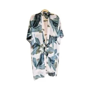 Avenue 9 tropical leaf print kimono with blue‑green leaves on semi‑sheer fabric, hanging on a hanger.