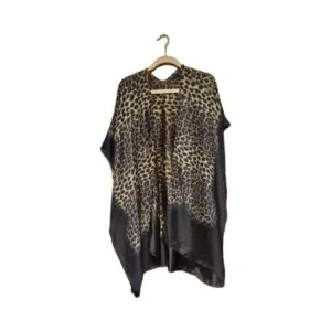 Silky leopard print kimono hanging on a hanger with a flowing open‑front design.