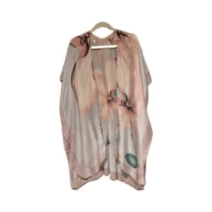 Front view of a light floral kimono with soft pink flowers and green leaves, silky 36-inch length.